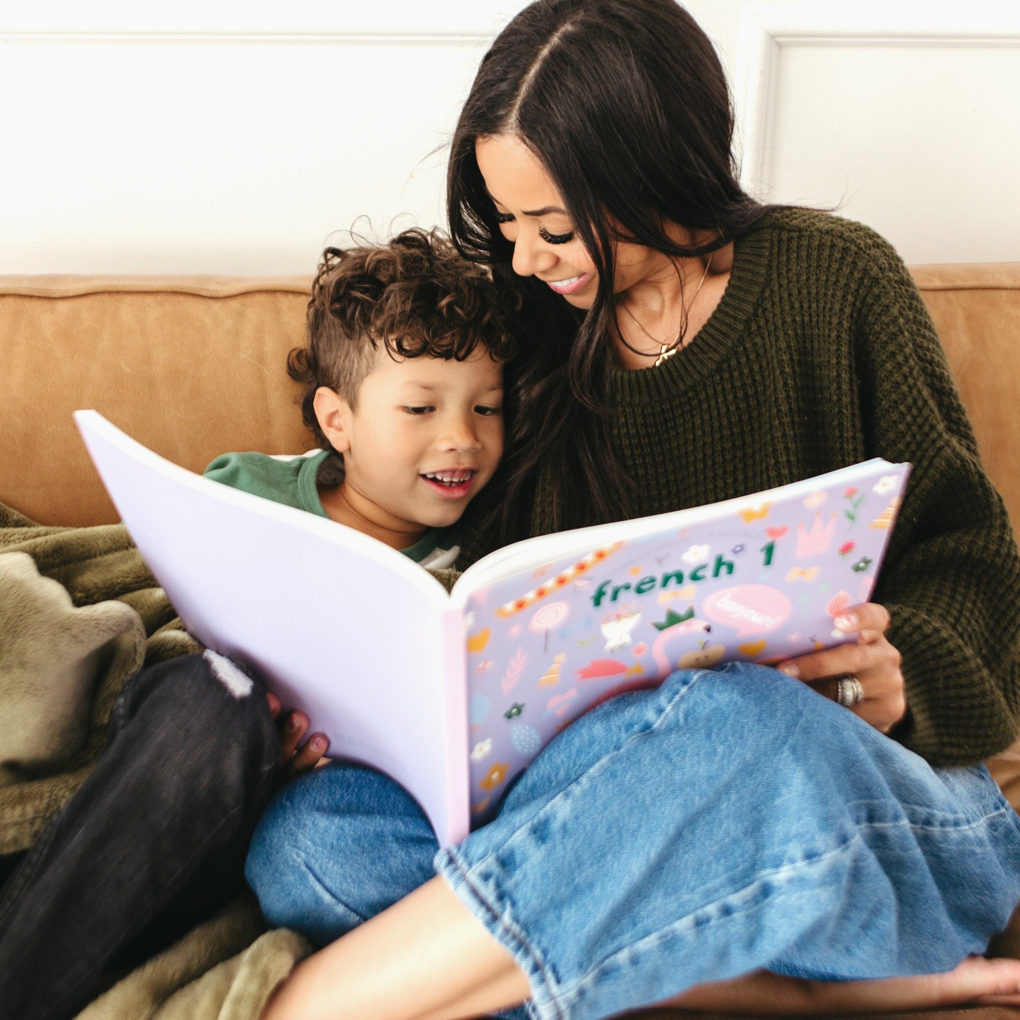 Mom and son reading French Level 1 together