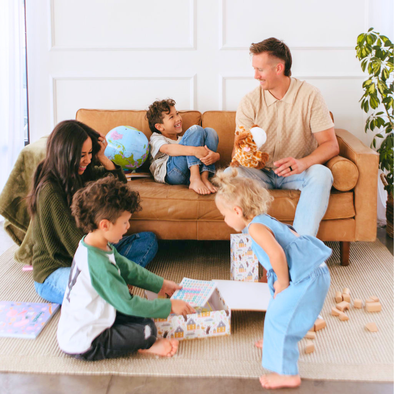 Children playing a picture-matching game with fruit vocabulary cards