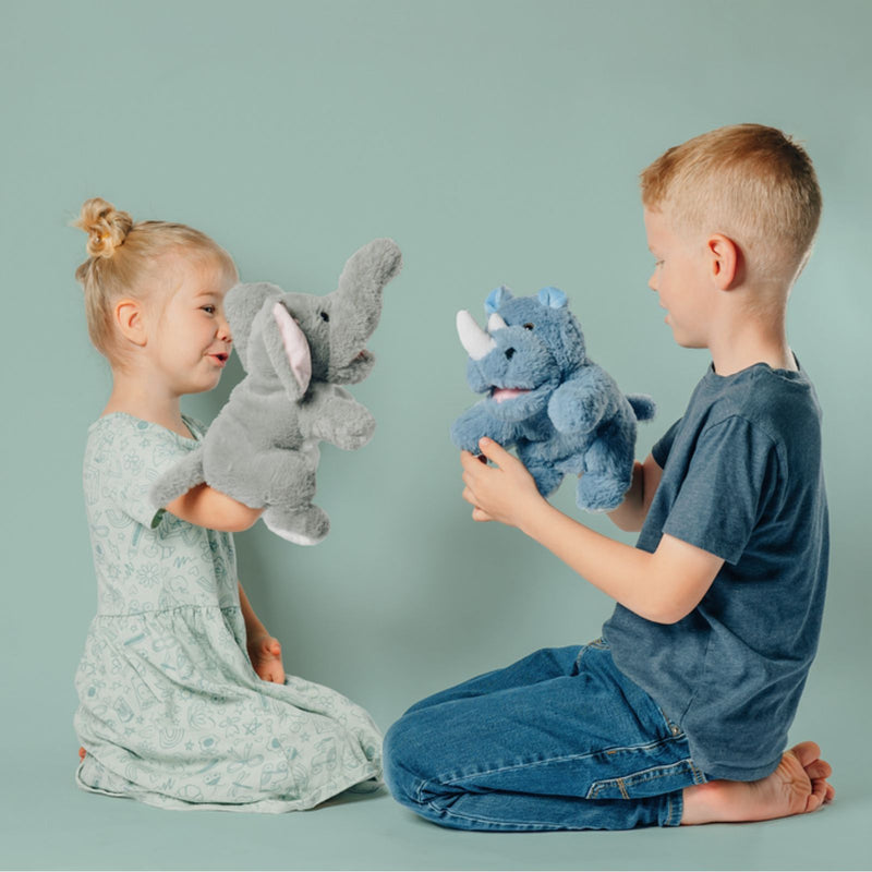 Children playing with a language-learning puppet during a homeschool lesson