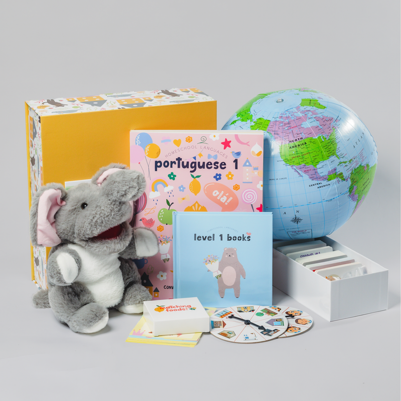 Family using language-learning games and books together at home